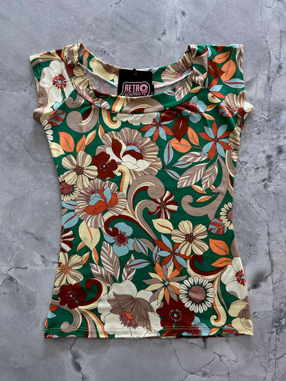 a flat lay of the boat neck top in mod floral