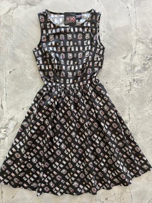 a flat lay image of the front of the Sale School vintage dress