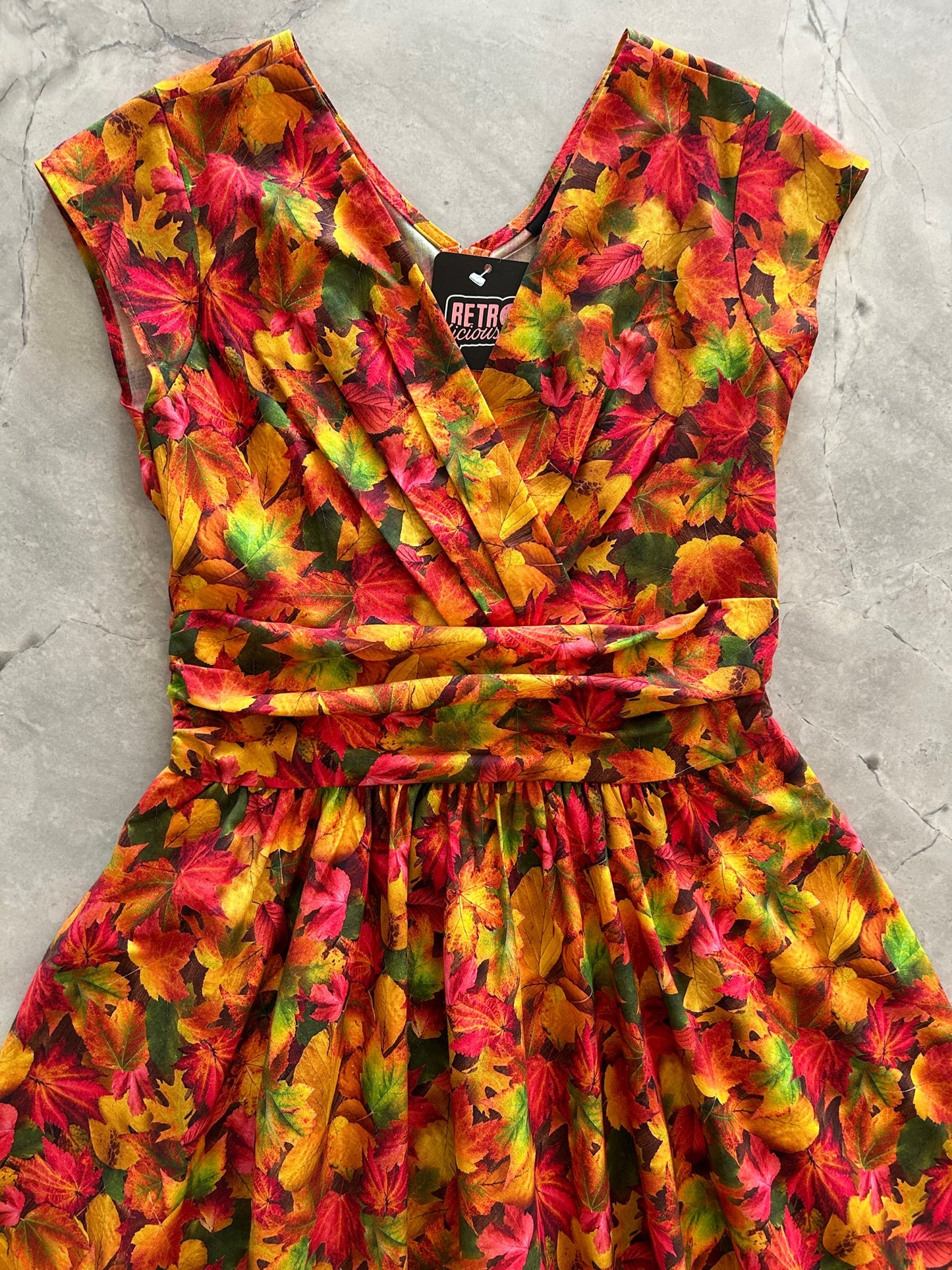 a close up of the bodice of our Fall Foliage Greta dress