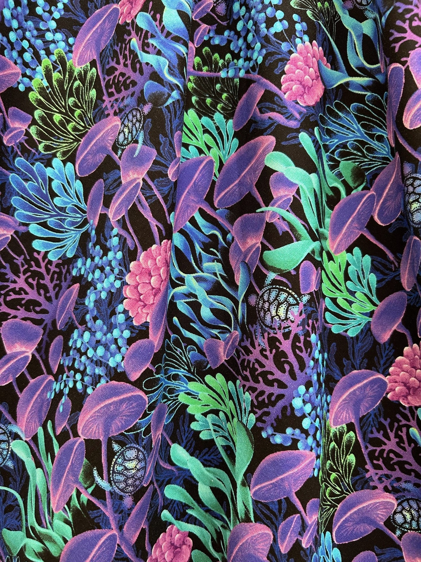 close up of the fabric showing sea life