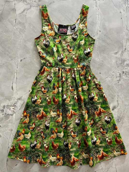 flatlay of spring chicken dress