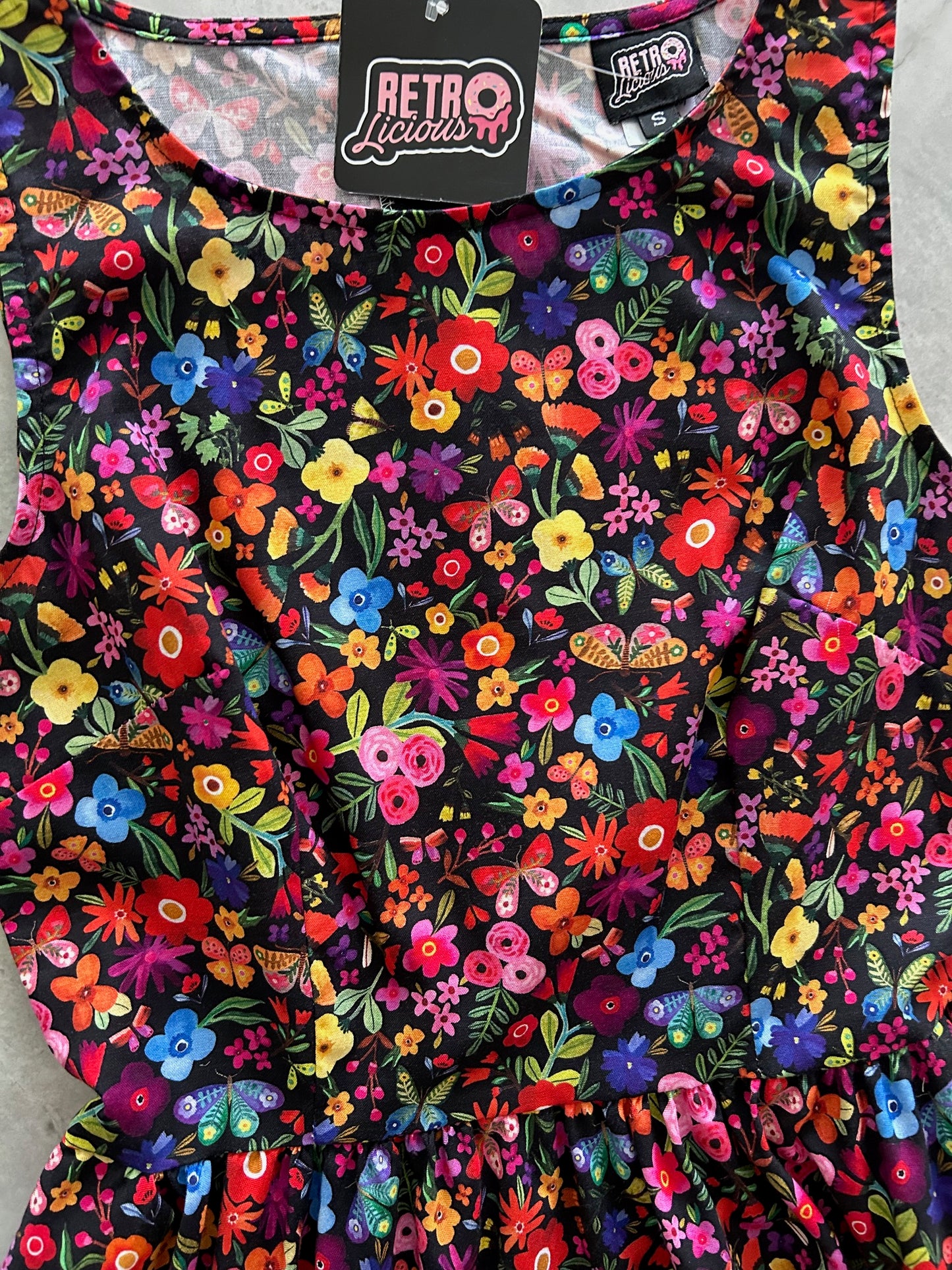 close up of bodice of butterfly midi dress
