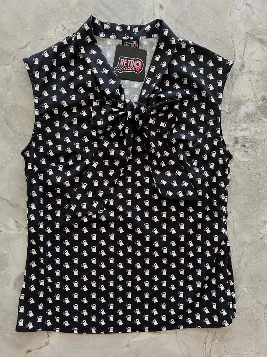 flatlay of mini ghosts bow top