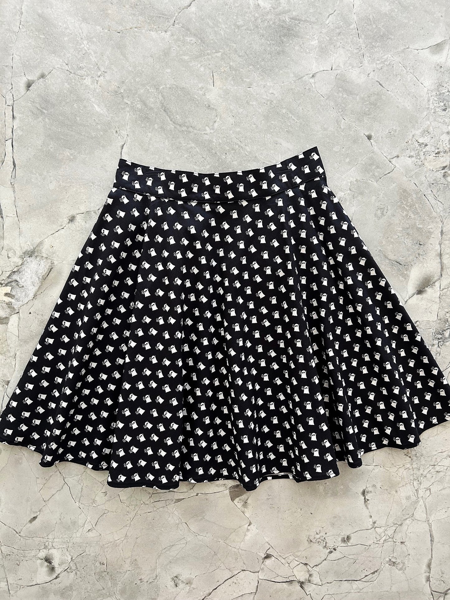flatlay of mini ghosts skater skirt