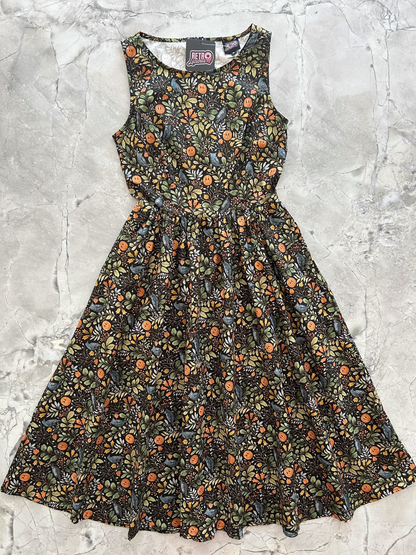 flatlay of Pumpkin Foliage Midi Dress