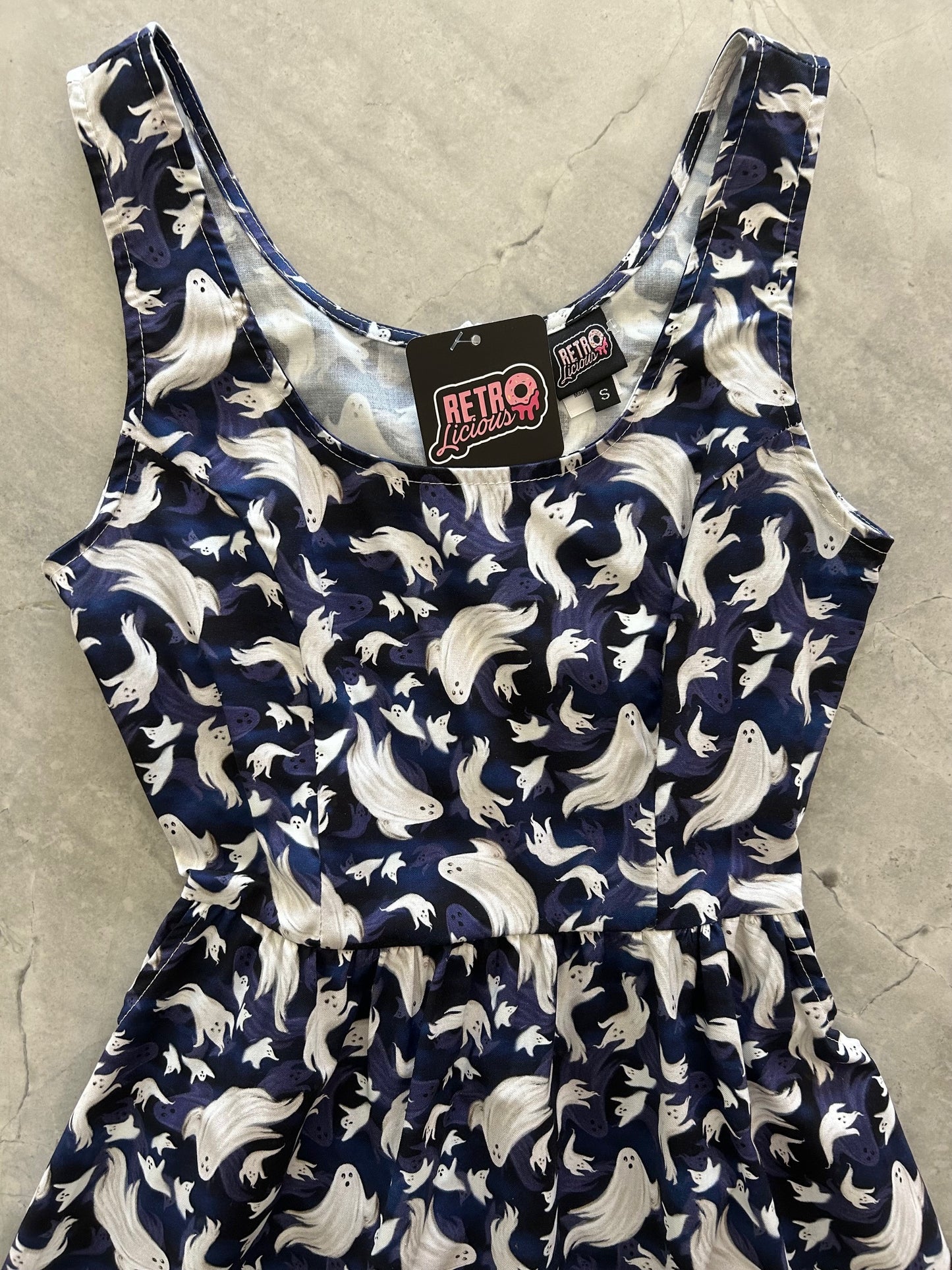 close up of bodice of flatlay of ghosts shorter length fit and flare dress