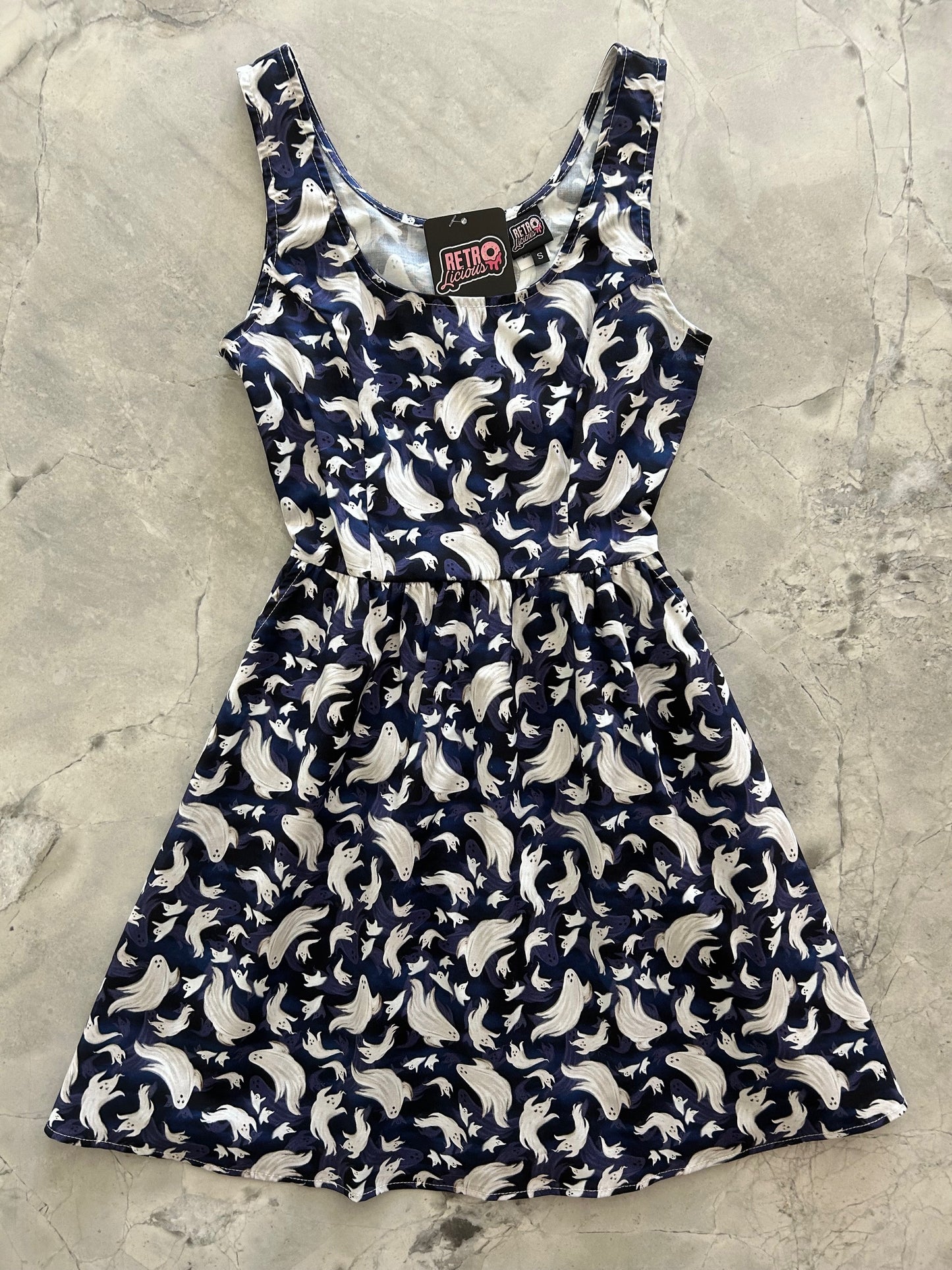 flatlay of ghosts shorter length fit and flare dress