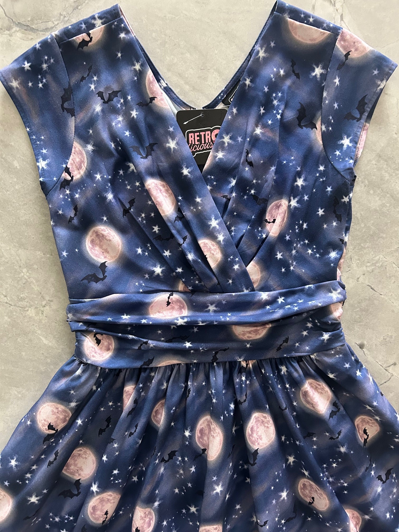 flatlay close up of bodice of bat moon greta dress