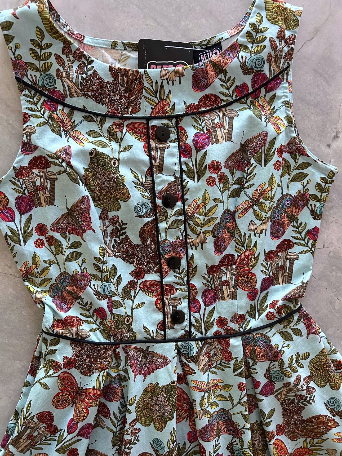flatlay of elizabeth dress in woodland whimsy close up of bodice