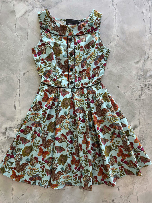 flatlay of elizabeth dress in woodland whimsy