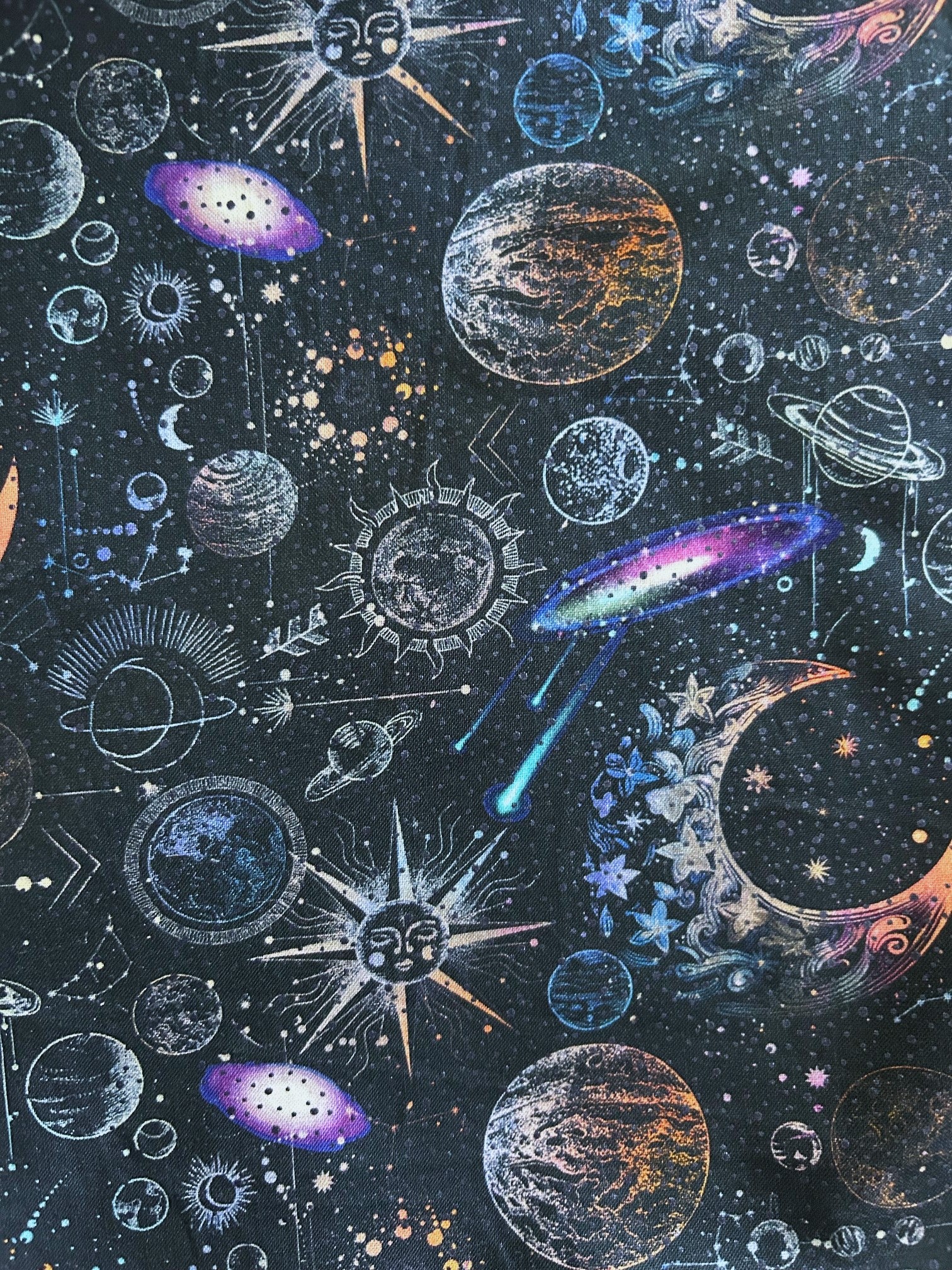close up of fabric of space vintage dress