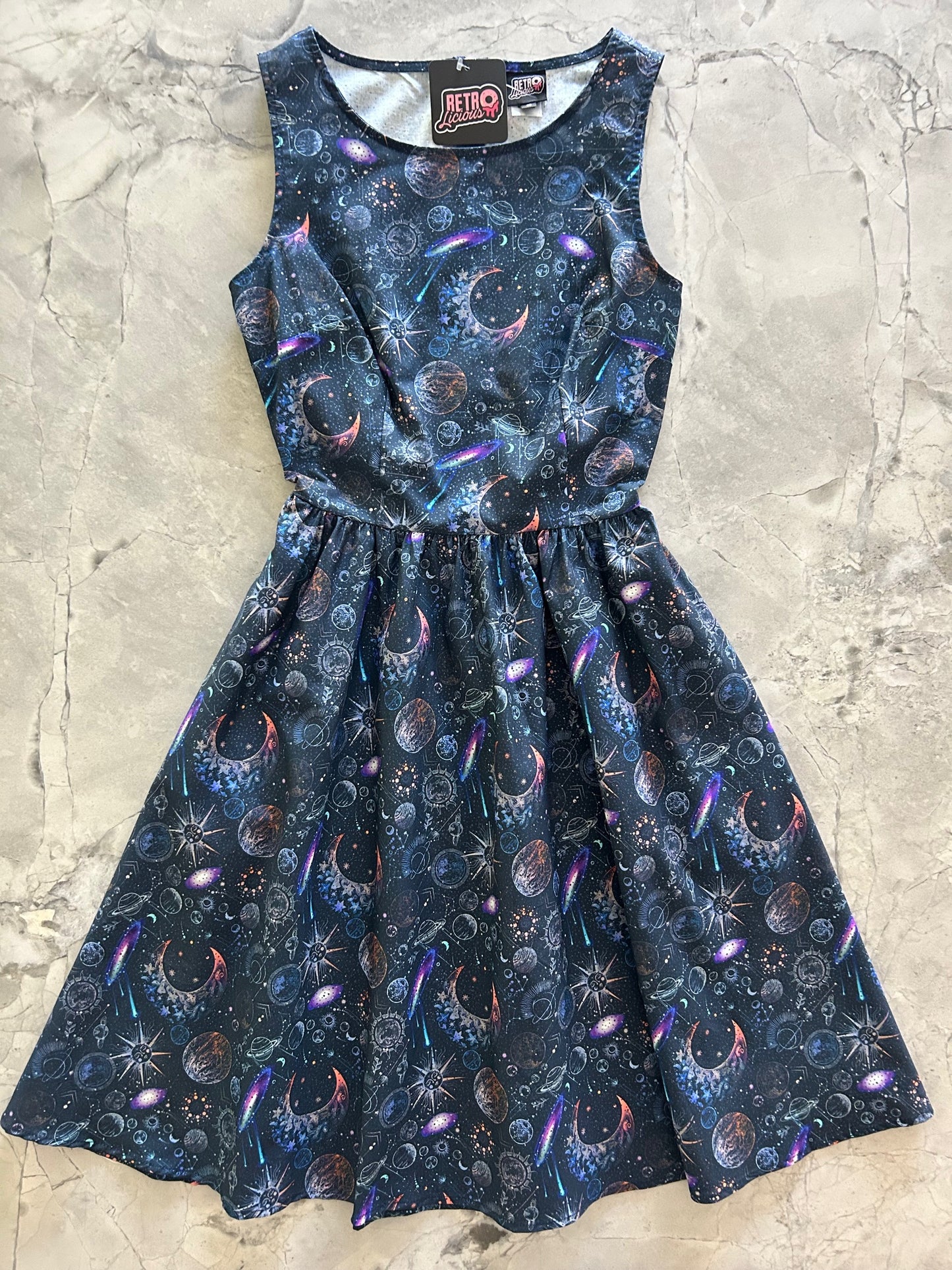 flatlay of space vintage dress
