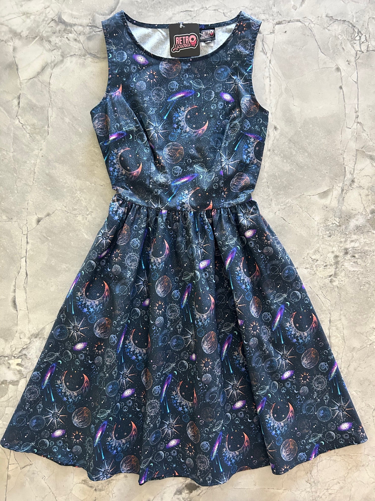 flatlay of space vintage dress