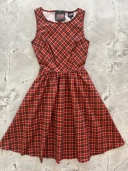 flatlay of plaid vintage dress