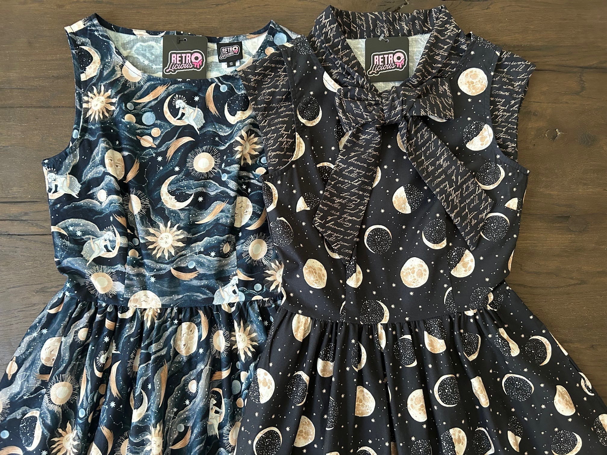 flat lay image of our luna dress and moon vintage dress shown layered with words bow top