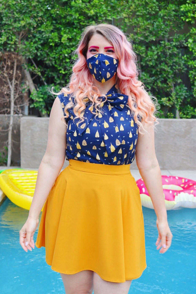 model wearing our beehive bow top with matching face mask