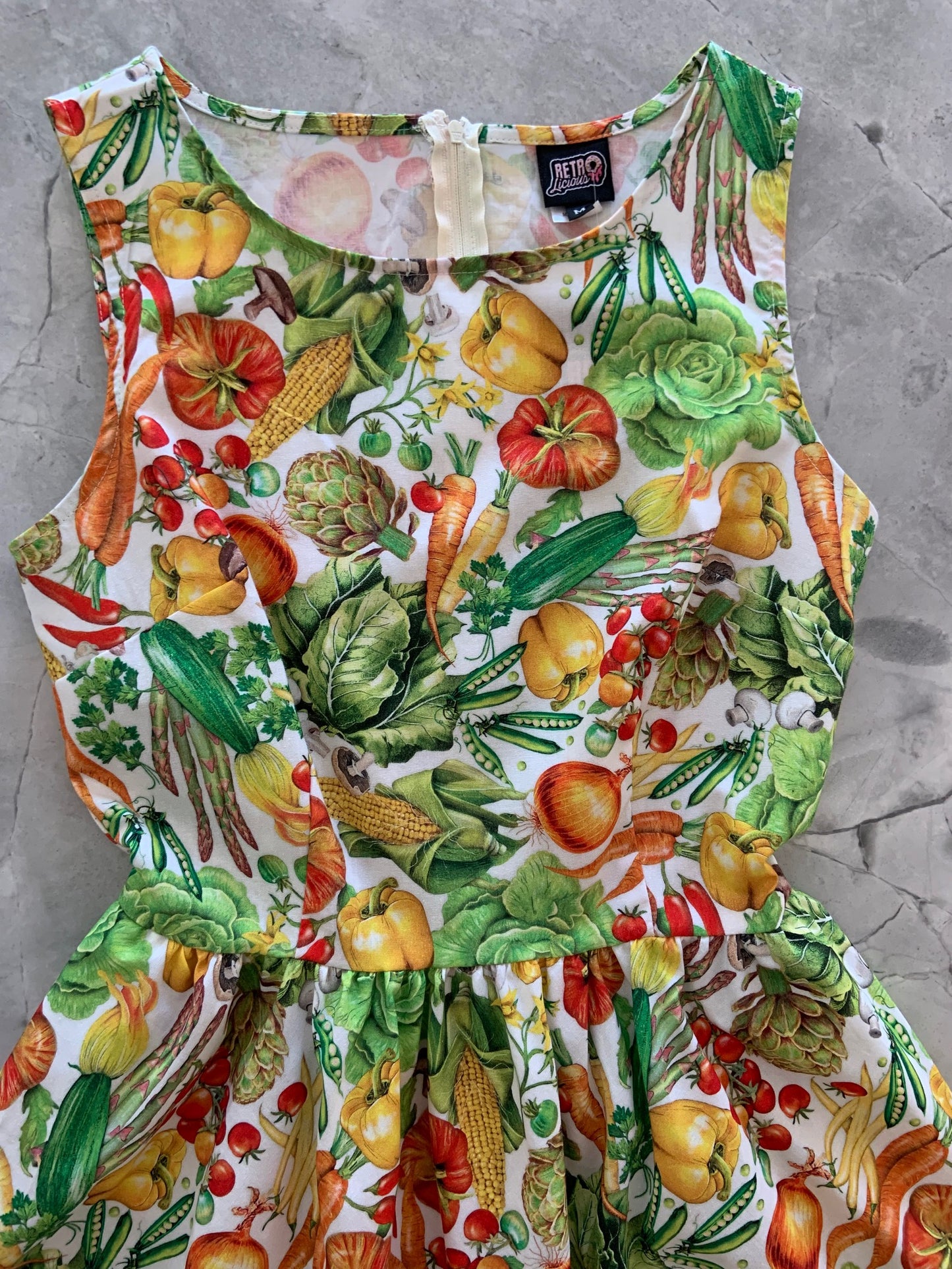 a close up of the bodice of the veggies vintage dress