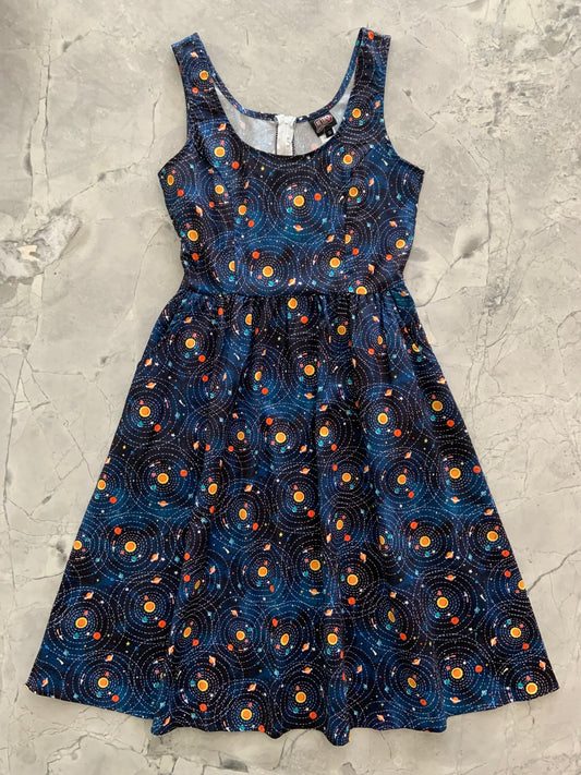 a flat lay of the front of the planetary alignment fit and flare dress