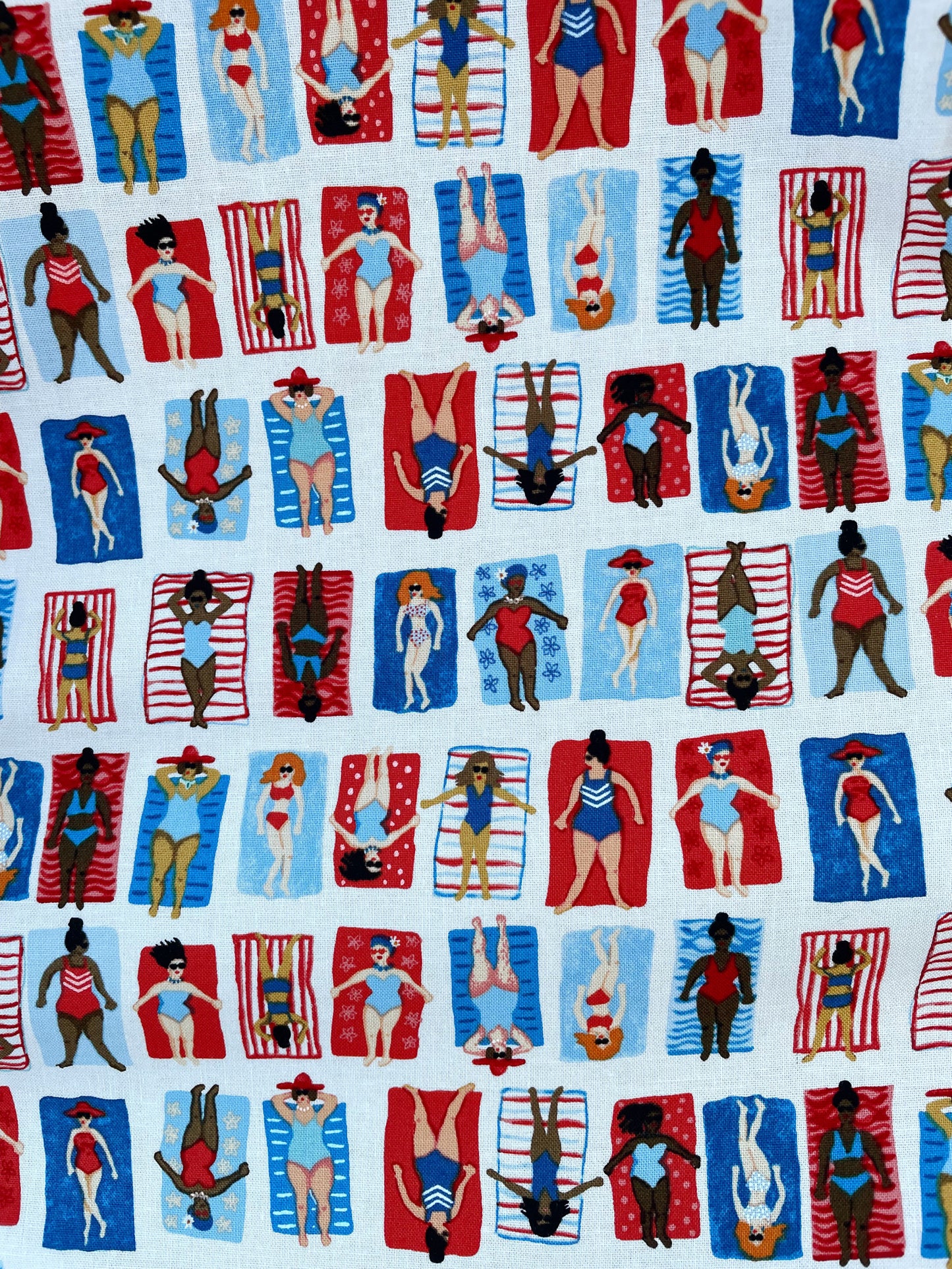 a close up of the fabric showing the print of sunny days