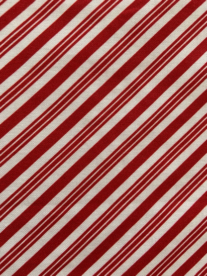 a close up of the fabric for our candy cane stripe bow top