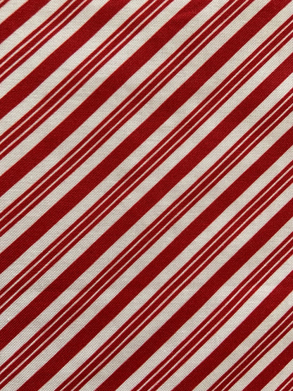 a close up of the fabric for our candy cane stripe bow top