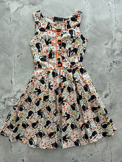 a flat lay image of the front of the Elizabeth dress in Cats