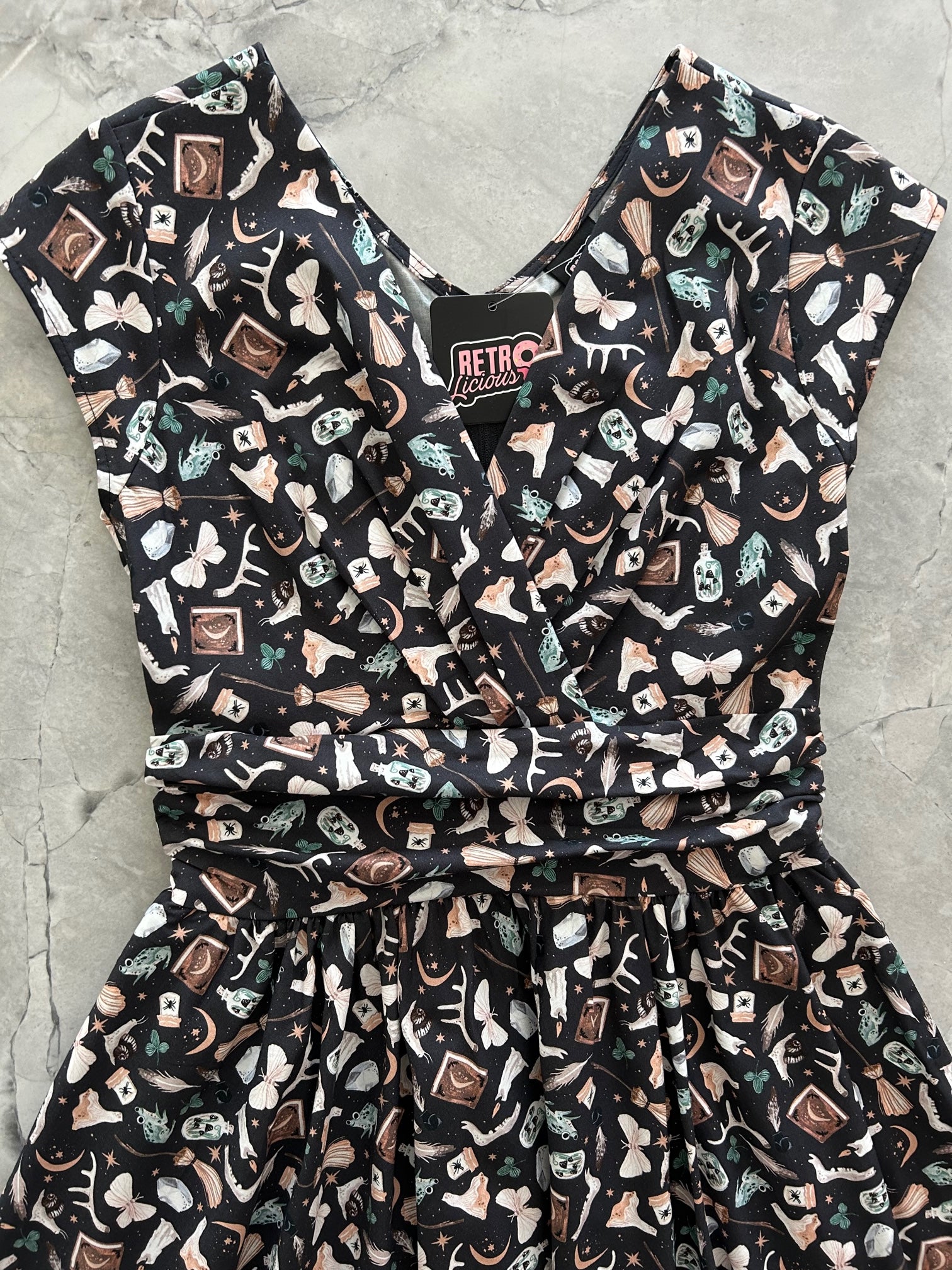 a close up of the front of the bodice of our Dark Academia Greta Dress