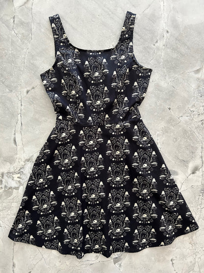 a flat image showing the front of our Apothecary Skater Dress 