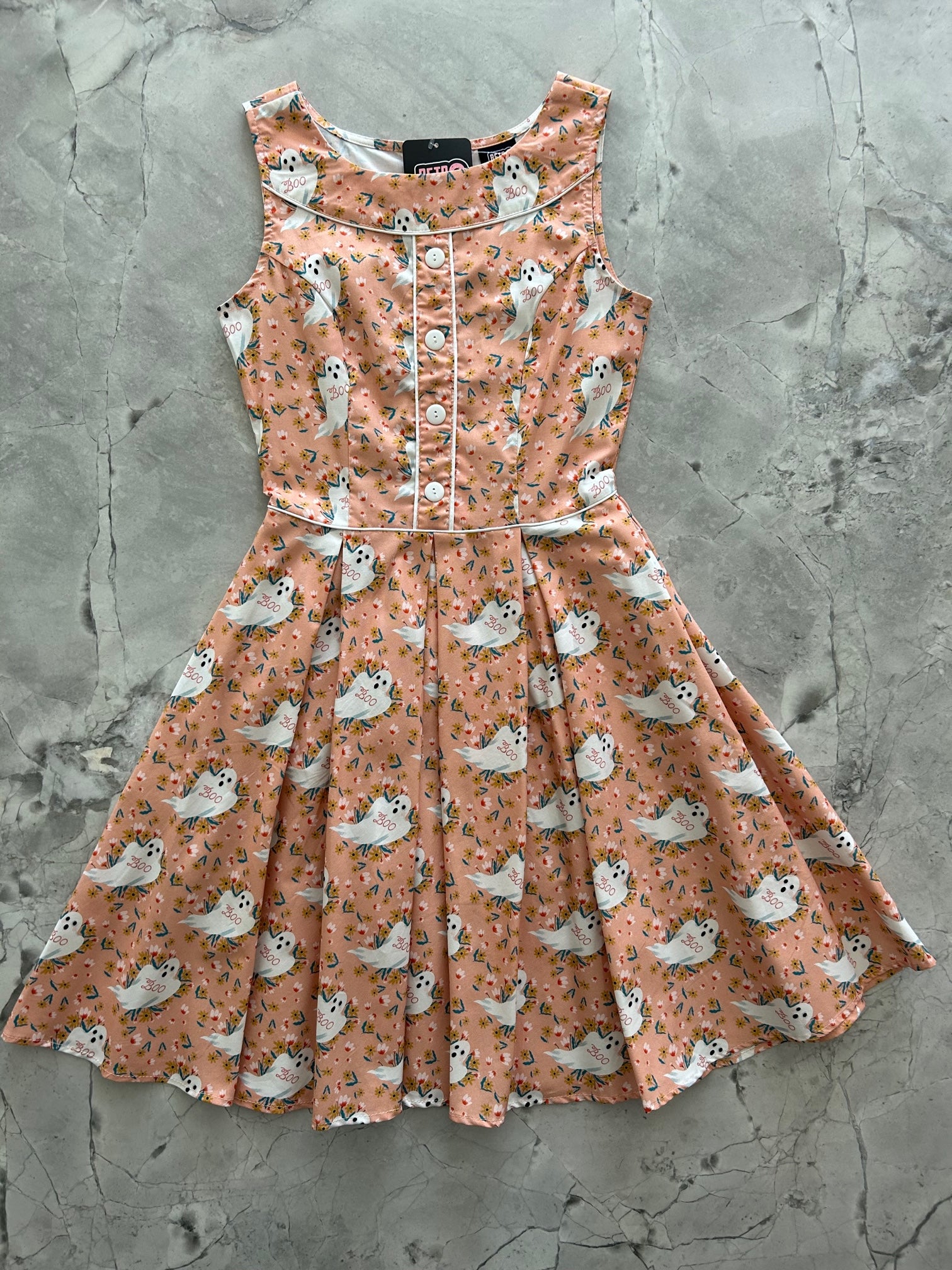 a flat lay of our Elizabeth Dress in Boo Ghosts