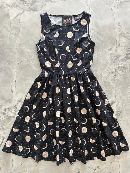 a flat layed out image of our Moon Vintage Dress showing the entire dress