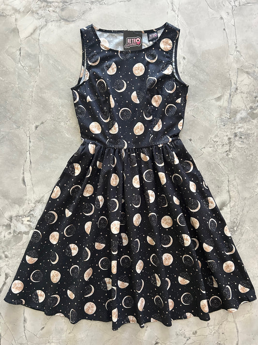 a flat layed out image of our Moon Vintage Dress showing the entire dress