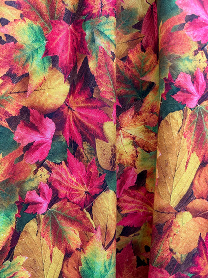a swatch up close of our Fall Foliage Greta dress showing the fall leaves