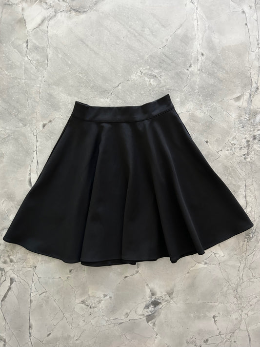 a flat lay image of the front of the harper skater skirt in black