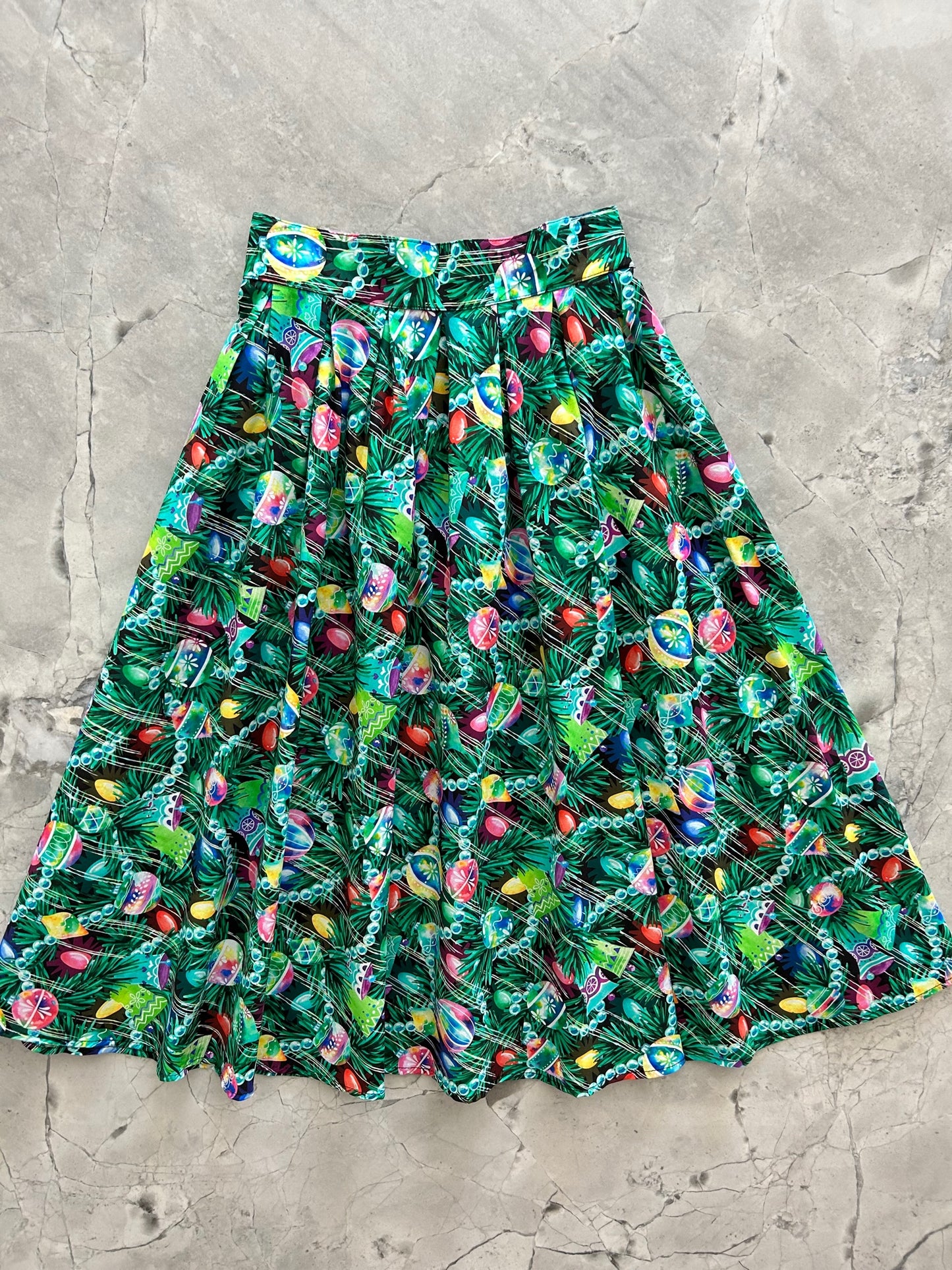 flat lay of a 50s style full swing skirt with ornament print