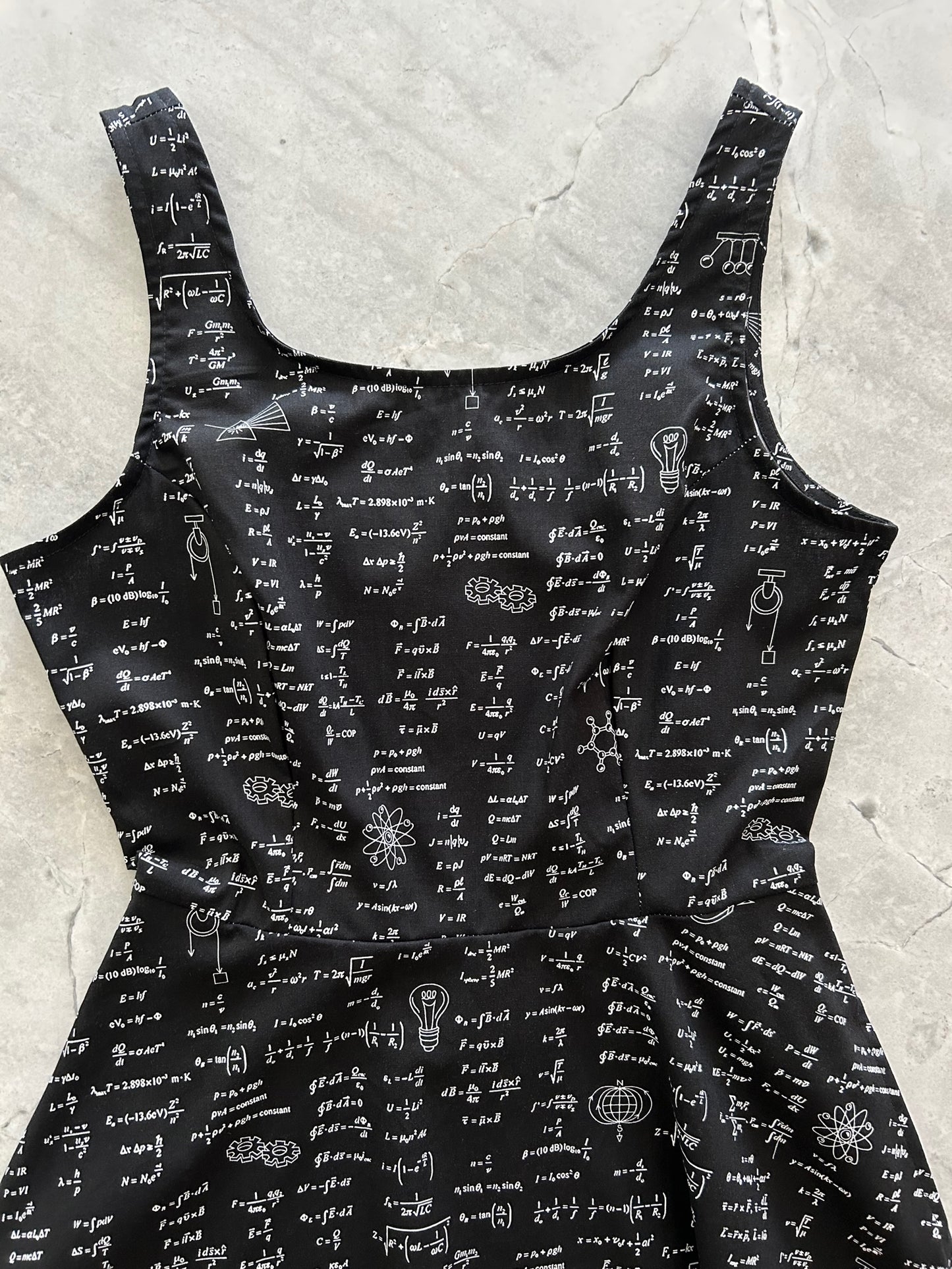 a close up of the bodice of our Equations skater dress
