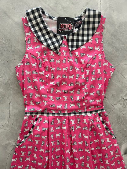 a close up flat lay showing the black and white gingham collar and contrast