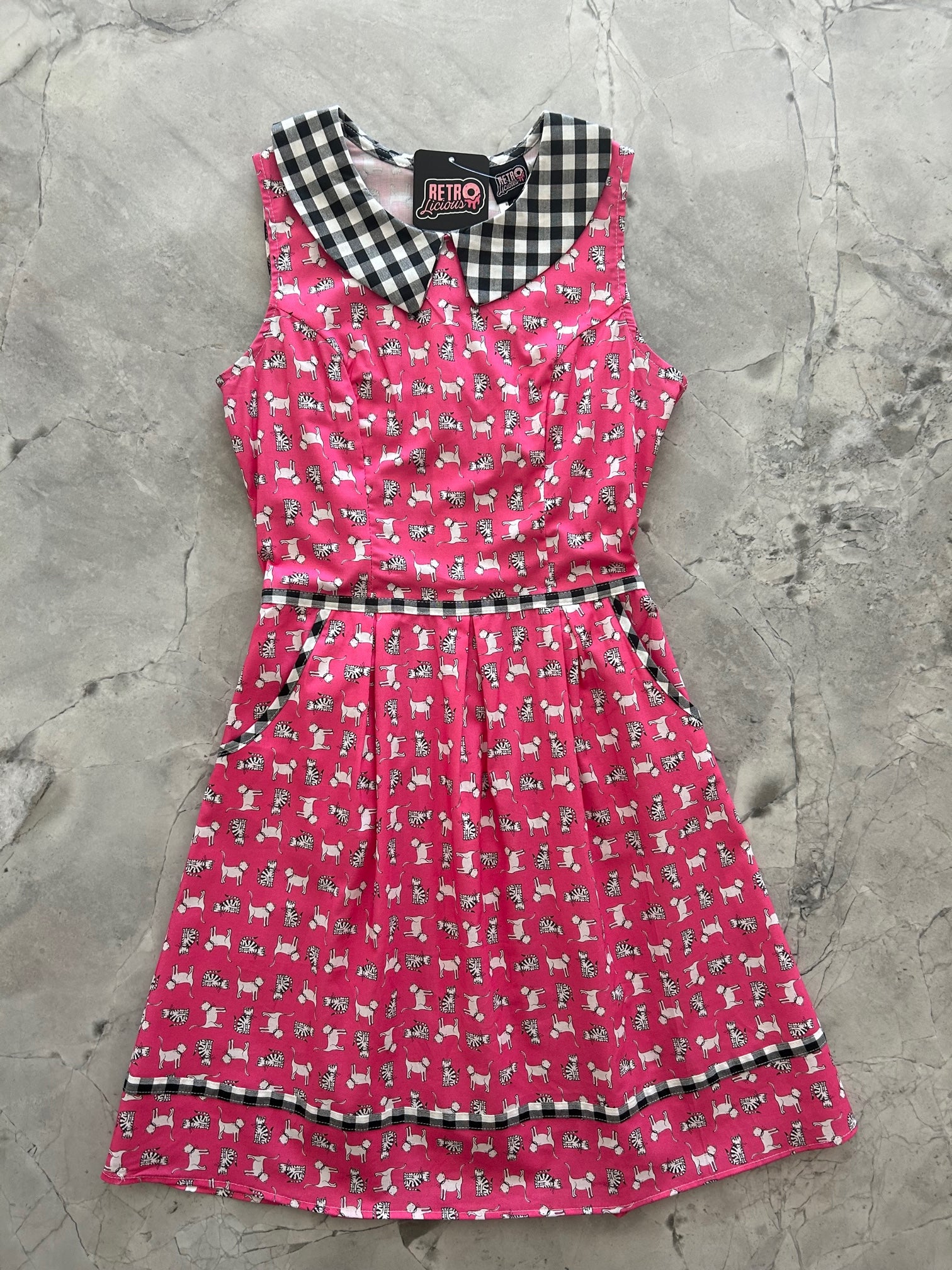 flat lay image of the cat's meow collared dress