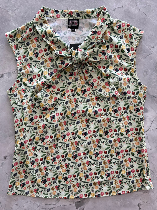 flat lay of the front of elves and ornaments bow top