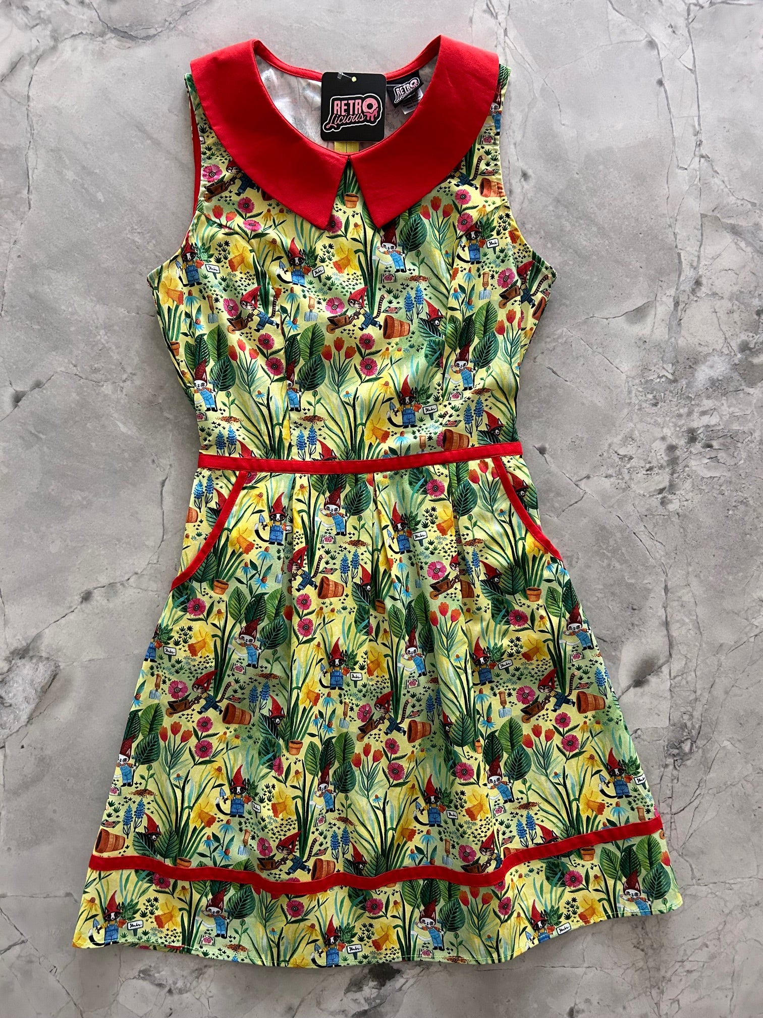 flat lay of garden collared dress shows front contrast detail 