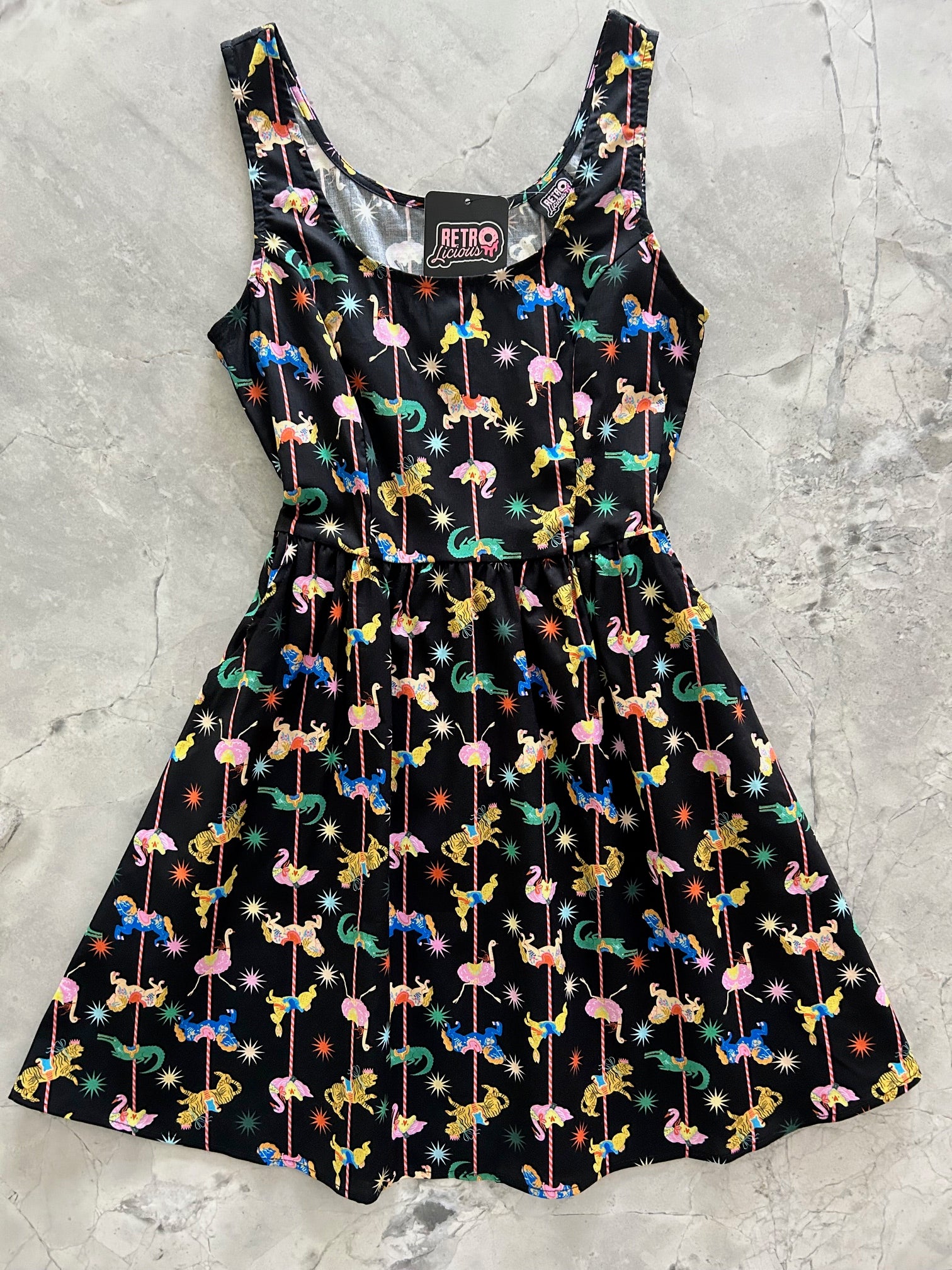flatlay of carousel dress 