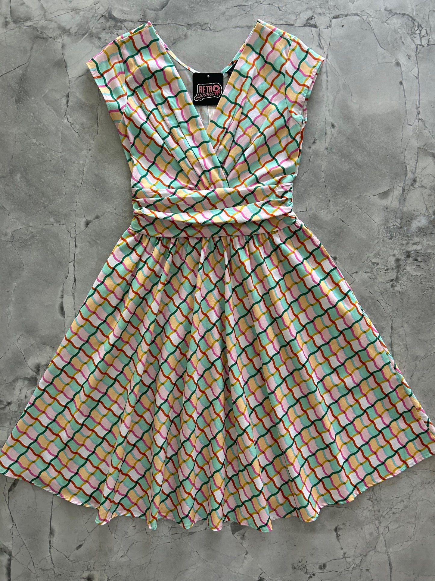 flatlay of fun times greta dress
