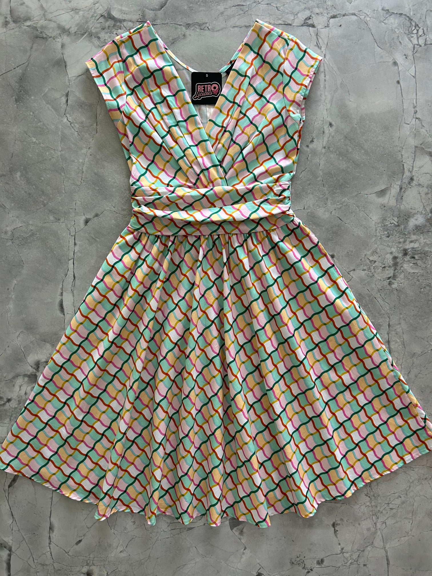 flatlay of fun times greta dress
