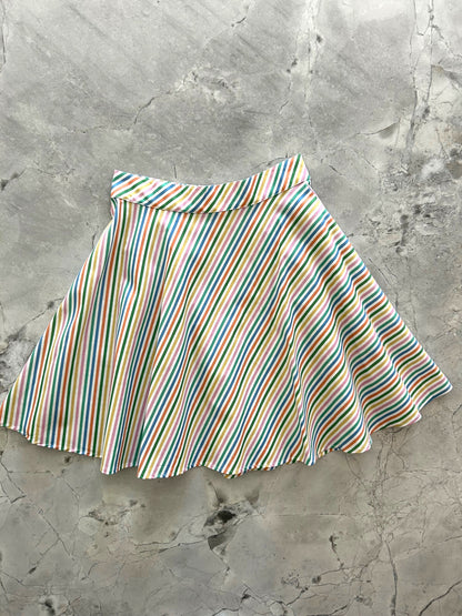 flatlay of rainbow stripe skirt