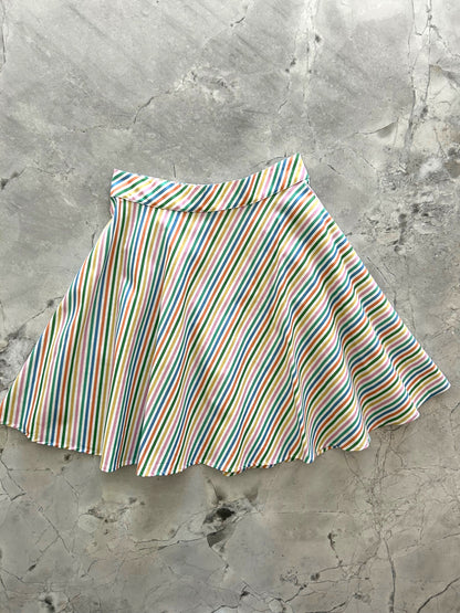 flatlay of rainbow stripe skirt