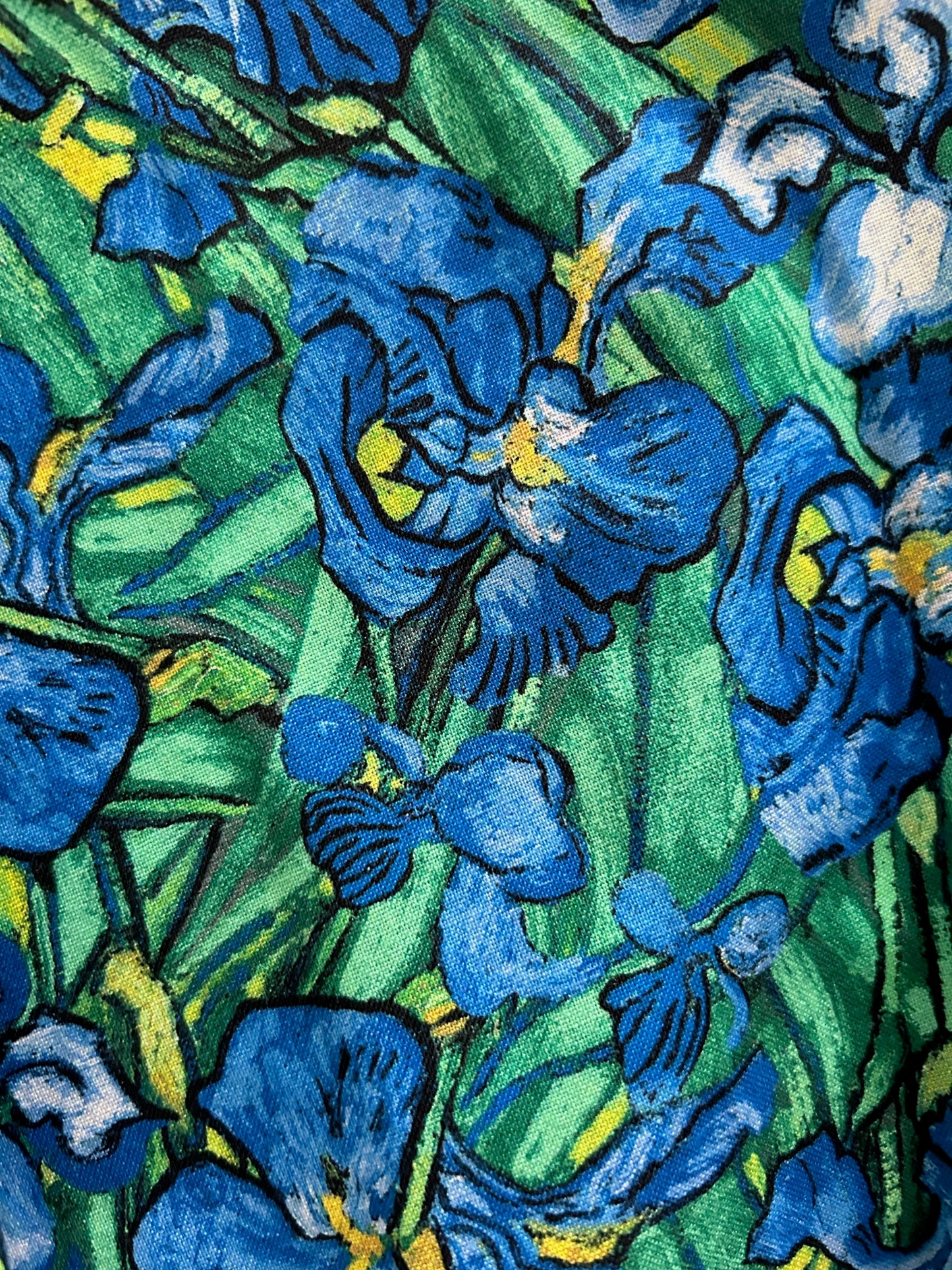 close up of the fabric showing the artsy painted look of the ireses
