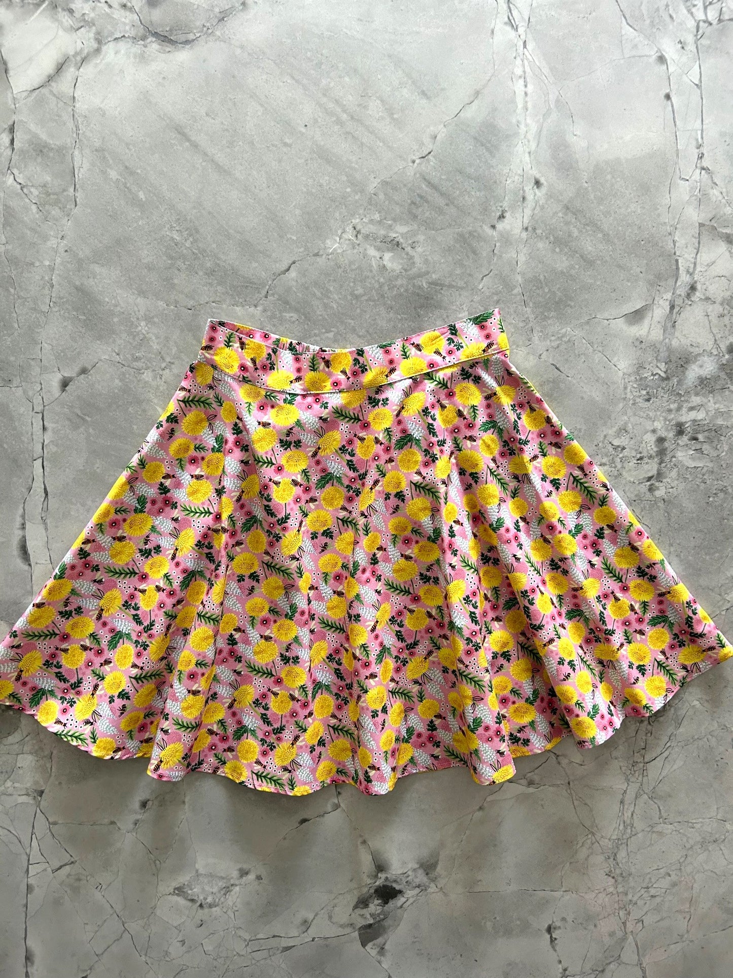 flat lay of the bees and dandelions skater skirt