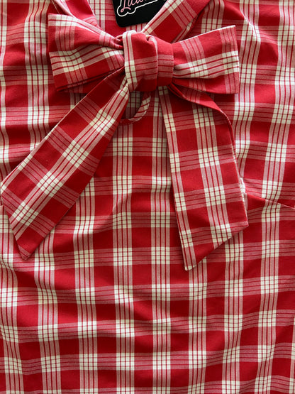 close up of the red plaid bow top showig the bow detail