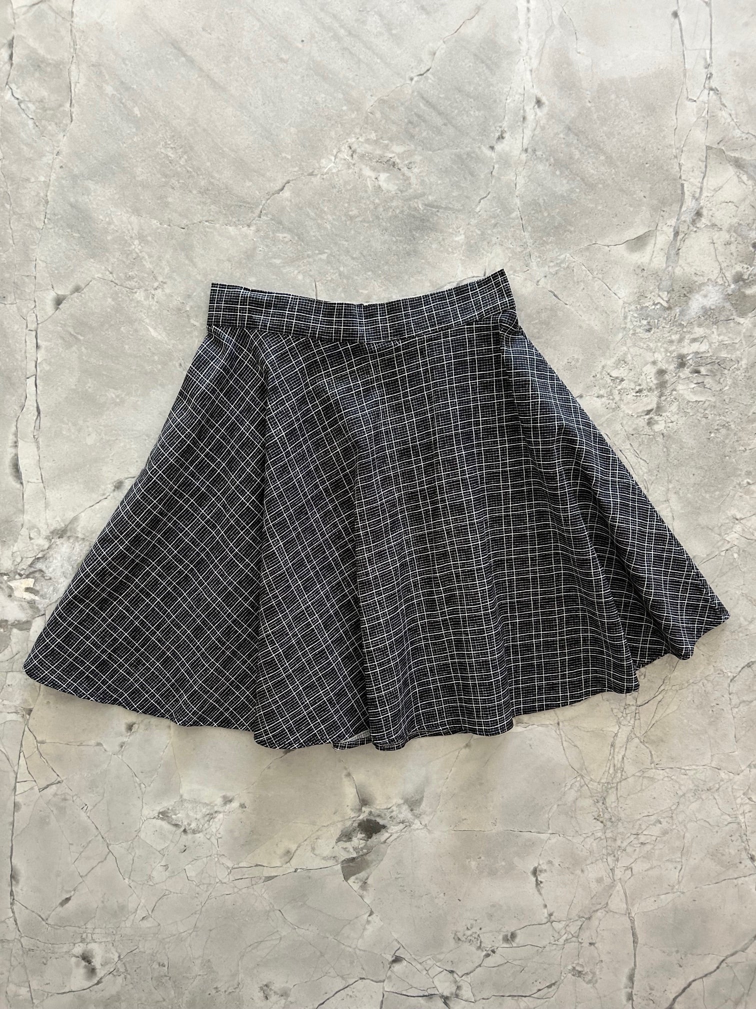 flatlay of sketch skater skirt