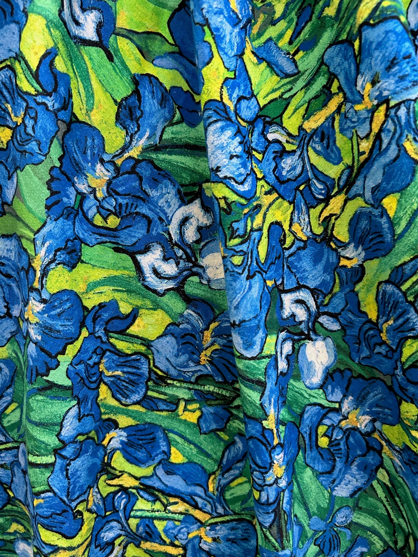 a close up of the fabric showing the irieses print