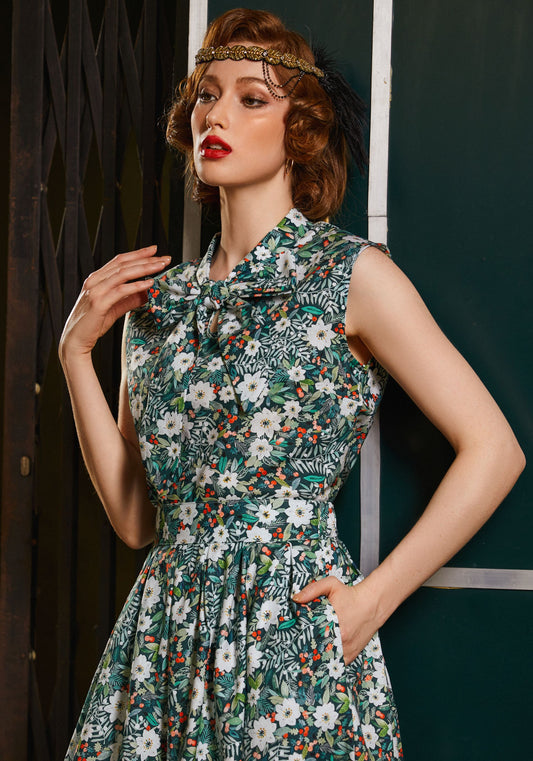 model wearing winter floral bow top